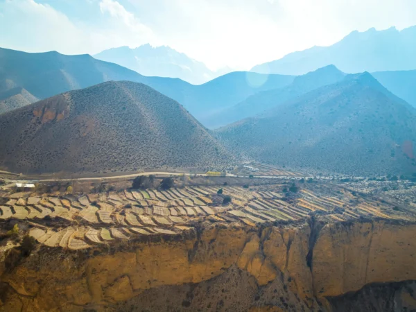 Explore the majestic terraced landscape of Lo Manthang in Nepal, showcasing its natural beauty