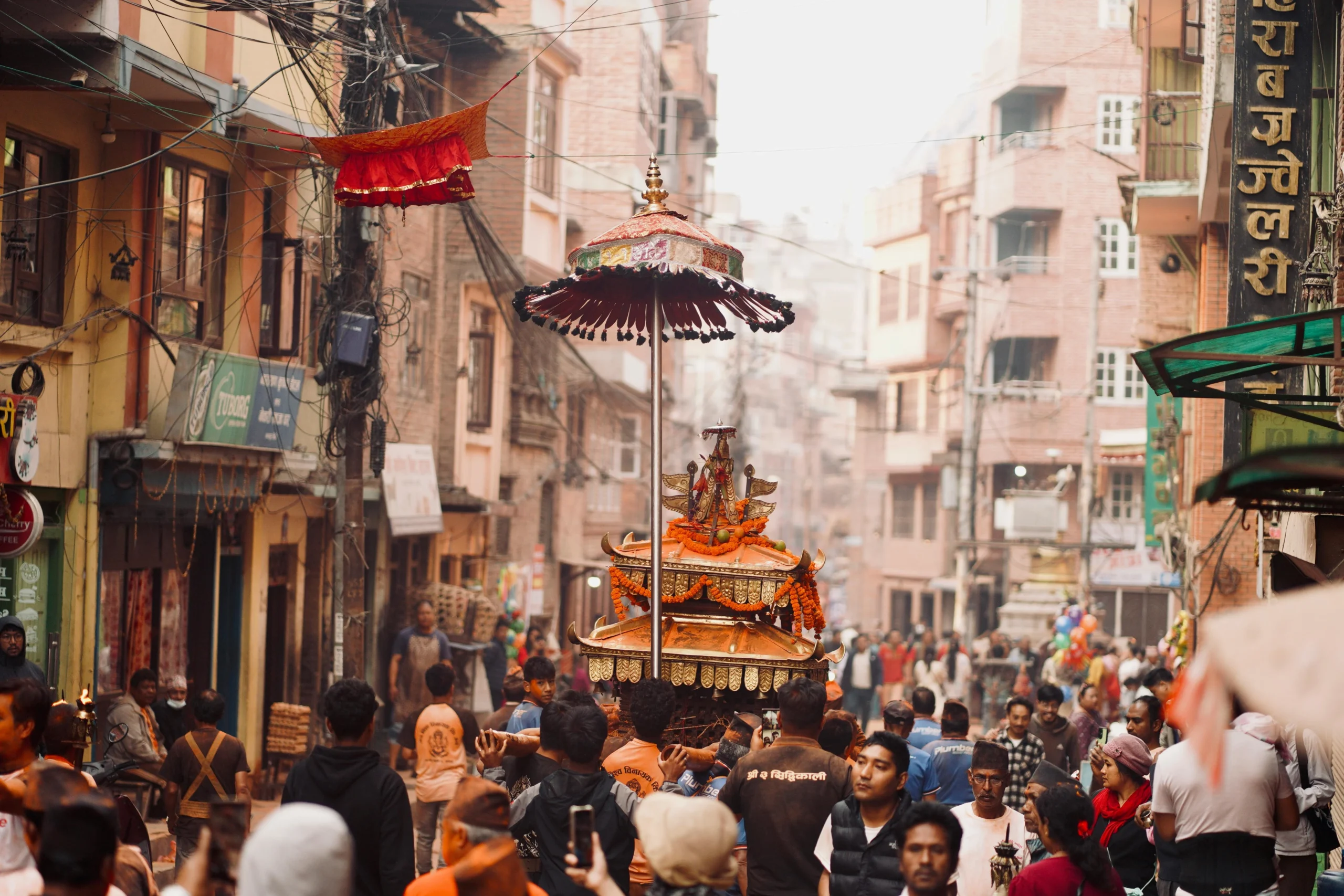 A lively street festival in Kathmandu, showcasing Nepalese culture and heritage with colorful processions and local participation